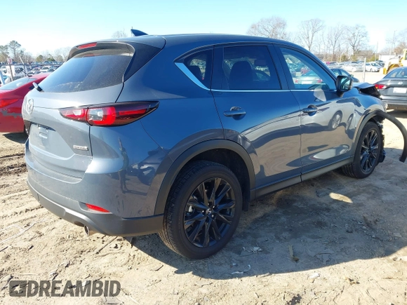 2024 Mazda CX-5 2.5 S Carbon Edition with VIN JM3KFBCM2R0373269, listed as a IAAI auction lot 41248095 with 10,611 mi miles. Bid and sale history available at carsss.com. Image 4.
