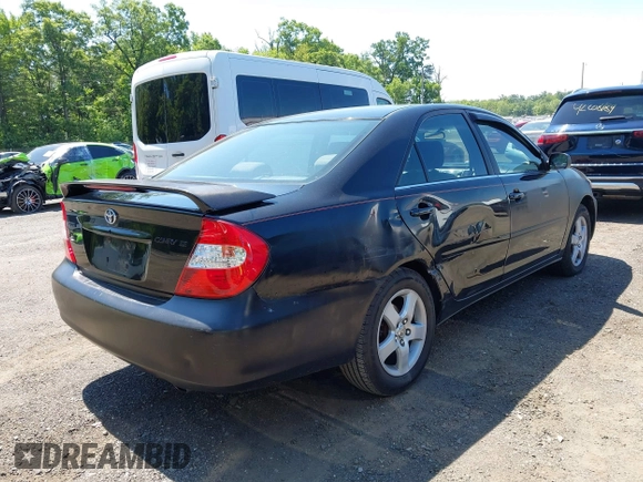 2002 Toyota Camry LE z VIN JTDBE32K020095947, wystawiony jako IAAI lot #42364984 z przebiegiem 198 756 mil mil oraz . Historia ofert i sprzedaży dostępna na DreamBid. Obrazek 4.