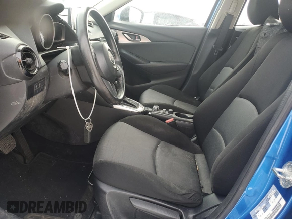2016 Mazda CX-3 Sport z VIN JM1DKBB72G0124864, wystawiony jako Copart lot #44143535 z przebiegiem 136 750 mil mil oraz Szkoda całkowita • Salvage title. Historia ofert i sprzedaży dostępna na DreamBid. Obrazek 7.