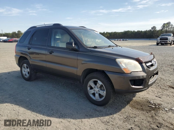 2009 Kia Sportage LX with VIN KNDJF724297573255, listed as a Copart auction lot 51300095 with 199,362 mi miles and Salvage Title. Bid and sale history available at carsss.com. Image 4.