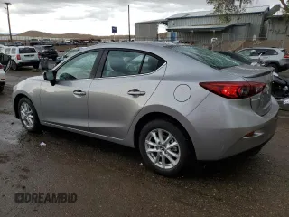2015 Mazda 3 i Grand Touring z VIN JM1BM1W76F1239689, wystawiony jako Copart lot #55343985 z przebiegiem 14 789 mil mil oraz Szkoda całkowita • Salvage title. Historia ofert i sprzedaży dostępna na DreamBid. Obrazek 2.
