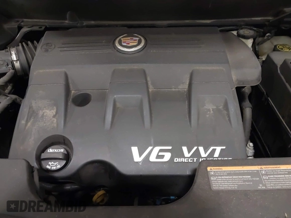 2015 Cadillac SRX with VIN 3GYFNAE36FS519604, listed as a IAAI auction lot 41215296 with 70,954 mi miles and . Bid and sale history available at DreamBid. Image 10.