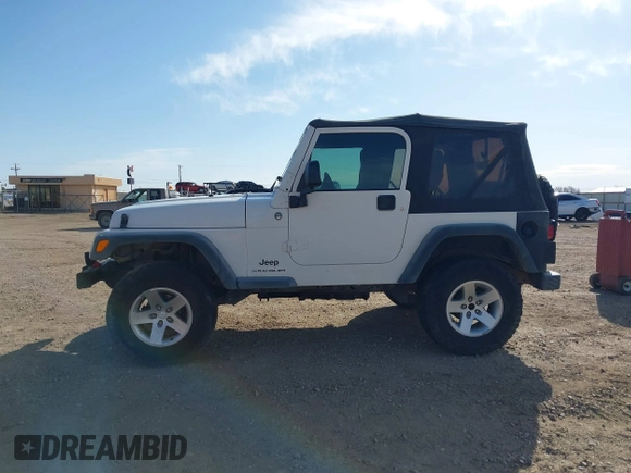 2005 Jeep Wrangler Sport with VIN 1J4FA49SX5P336380, listed as a IAAI auction lot 41752554 with 139,004 mi miles. Bid and sale history available at carsss.com. Image 14.