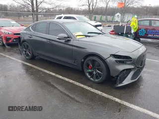 2023 Genesis G70 3.3T with VIN KMTG54TEXPU107334, listed as a IAAI auction lot 41565440 with 19,816 mi miles. Bid and sale history available at carsss.com. Image 1.