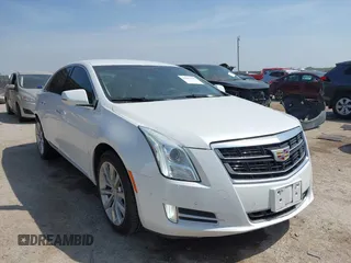 2016 Cadillac XTS Luxury Collection z VIN 2G61M5S37G9105733, wystawiony jako IAAI lot #42057398 z przebiegiem 82 347 mil mil oraz . Historia ofert i sprzedaży dostępna na DreamBid. Obrazek 1.
