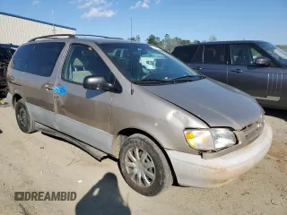 2000 Toyota Sienna LE with VIN 4T3ZF13C4YU304036, listed as a Copart auction lot 72448274 with 176,388 mi miles and Salvage Title. Bid and sale history available at carsss.com. Image 4.