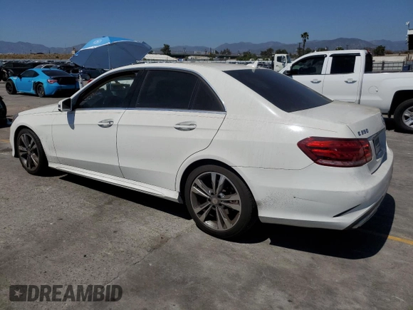 2014 Mercedes-Benz E 350 Sport with VIN WDDHF5KB0EA846889, listed as a Copart auction lot 56346475 with 110,930 mi miles and Salvage title. Bid and sale history available at DreamBid. Image 2.