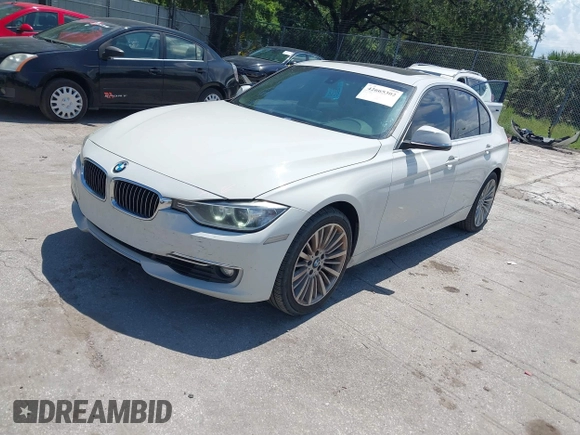 2014 BMW 3 Series 328i with VIN WBA3A5C54EP600398, listed as a IAAI auction lot 42665302 with 117,012 mi miles and . Bid and sale history available at DreamBid. Image 17.