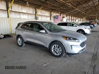 2020 Ford Escape SE with VIN 1FMCU0G60LUC25023, listed as a Copart auction lot 52728735 with 112,966 mi miles and Salvage title. Bid and sale history available at DreamBid. Image 4.