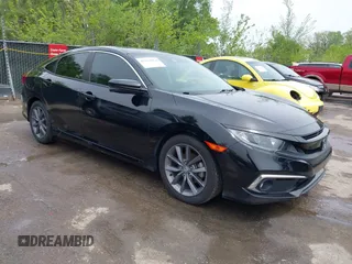 2019 Honda Civic EX z VIN 19XFC1F39KE017866, wystawiony jako IAAI lot #42114454 z przebiegiem 66 497 mil mil oraz . Historia ofert i sprzedaży dostępna na DreamBid. Obrazek 1.