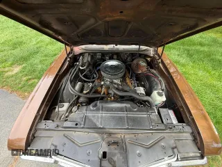 1972 Oldsmobile Cutlass z VIN 3F87H2G149401, wystawiony jako Copart lot #58824075 z przebiegiem 19 878 mil mil oraz Tytuł czysty. Historia ofert i sprzedaży dostępna na DreamBid. Obrazek 9.
