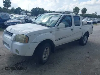 2001 Nissan Frontier SE z VIN 1N6ED27T61C324671, wystawiony jako IAAI lot #42403537 z przebiegiem 190 638 mil mil oraz . Historia ofert i sprzedaży dostępna na DreamBid. Obrazek 2.