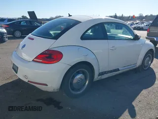 2012 Volkswagen Beetle 2.5L PZEV with VIN 3VWHP7AT6CM622309, listed as a IAAI auction lot 41681789 with 135,155 mi miles. Bid and sale history available at carsss.com. Image 4.