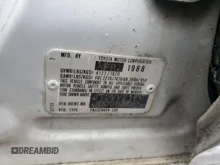 1988 Toyota Camry z VIN JT2VV21E8J0008306, wystawiony jako Copart lot #82378704 z przebiegiem 245 078 mil mil oraz Szkoda całkowita • Salvage title. Historia ofert i sprzedaży dostępna na DreamBid. Obrazek 12.