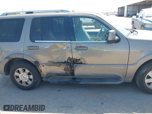 2004 Lincoln Aviator Luxury z VIN 5LMEU68H74ZJ01196, wystawiony jako IAAI lot #41853470 z przebiegiem 102 112 mil mil oraz . Historia ofert i sprzedaży dostępna na DreamBid. Obrazek 13.