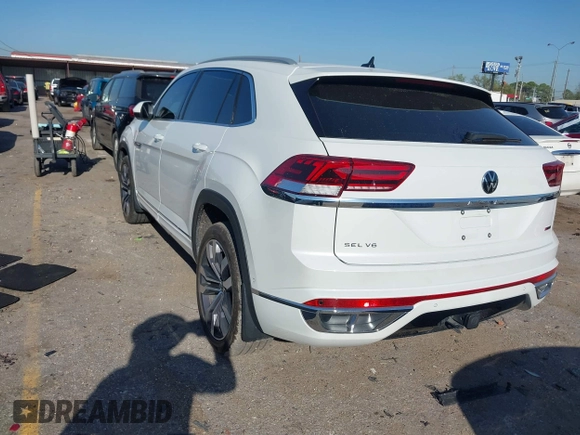 2022 Volkswagen Atlas SEL Premium R-Line with VIN 1V2FE2CA6NC220596, listed as a IAAI auction lot 41864407 with 13,120 mi miles and . Bid and sale history available at DreamBid. Image 3.