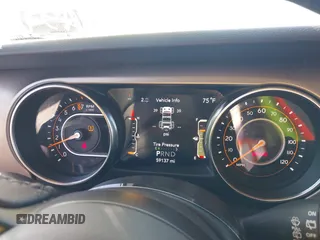 2020 Jeep Wrangler Unlimited Black and Tan with VIN 1C4HJXDGXLW219078, listed as a IAAI auction lot 41783437 with 59,137 mi miles and . Bid and sale history available at DreamBid. Image 7.