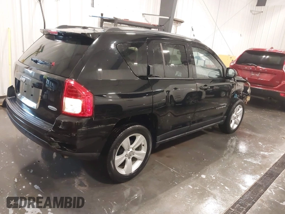 2013 Jeep Compass High Altitude with VIN 1C4NJCEA0DD124354, listed as a IAAI auction lot 41958799 with 19,999 mi miles. Bid and sale history available at carsss.com. Image 4.