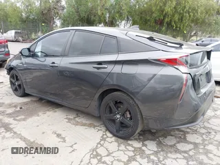 2016 Toyota Prius Four with VIN JTDKARFU8G3015083, listed as a IAAI auction lot 42191765 with 168,820 mi miles and . Bid and sale history available at DreamBid. Image 3.