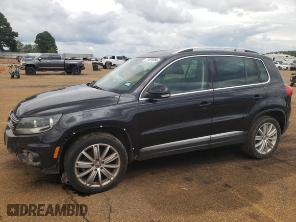 2014 Volkswagen Tiguan SEL with VIN WVGAV3AX5EW558929, listed as a Copart auction lot 71004684 with 125,628 mi miles and Clean title. Bid and sale history available at DreamBid. Image 1.