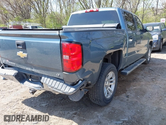2014 Chevrolet Silverado 1500 LT with VIN 3GCUKREH9EG313565, listed as a IAAI auction lot 42003086 with 112,322 mi miles and . Bid and sale history available at DreamBid. Image 4.
