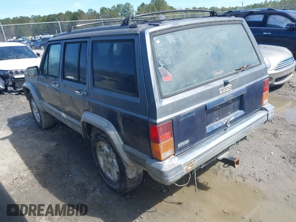 1996 Jeep Cherokee Country with VIN 1J4FT78S5TL148433, listed as a IAAI auction lot 41722054 with 276,612 mi miles and . Bid and sale history available at DreamBid. Image 3.