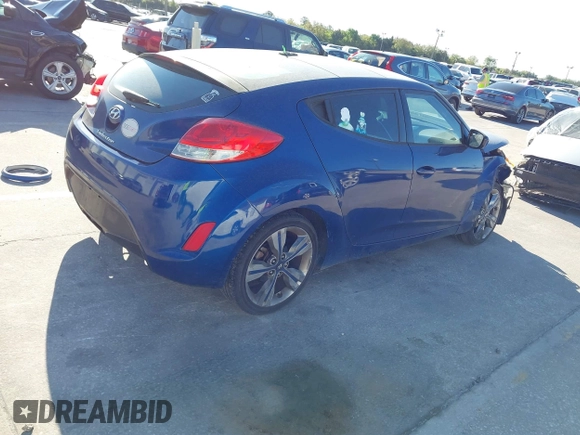 2016 Hyundai Veloster with VIN KMHTC6AD8GU302014, listed as a IAAI auction lot 41764406 with 102,893 mi miles. Bid and sale history available at carsss.com. Image 4.