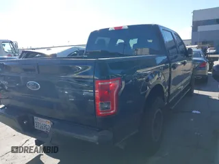 2015 Ford F-150 XL with VIN 1FTEW1CGXFKD98530, listed as a IAAI auction lot 41687753 with 104,281 mi miles. Bid and sale history available at carsss.com. Image 4.