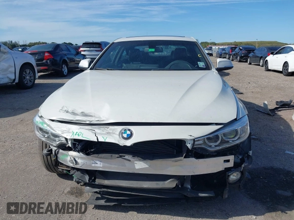 2016 BMW 4 Series 428i with VIN WBA3N7C57GK227468, listed as a IAAI auction lot 41188647 with 81,115 mi miles and . Bid and sale history available at carsss.com. Image 13.