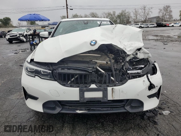 2021 BMW 3 Series 330i with VIN 3MW5R1J0XM8B48990, listed as a Copart auction lot 49277185 with 69,776 mi miles and Salvage Title. Bid and sale history available at carsss.com. Image 5.