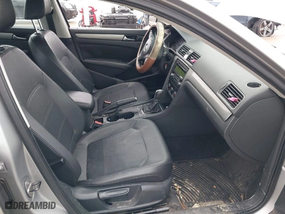 2014 Volkswagen Passat Wolfsburg Ed with VIN 1VWAT7A32EC028320, listed as a IAAI auction lot 41456457 with 173,581 mi miles. Bid and sale history available at carsss.com. Image 5.