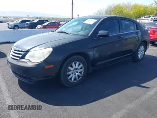 2010 Chrysler Sebring Touring with VIN 1C3CC4FB6AN207070, listed as a IAAI auction lot 42131880 with 155,362 mi miles. Bid and sale history available at carsss.com. Image 2.
