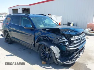 2023 Volkswagen Atlas SE with VIN 1V2WR2CA6PC504480, listed as a IAAI auction lot 41859823 with 32,707 mi miles and . Bid and sale history available at DreamBid. Image 1.