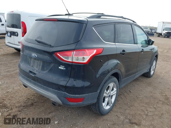 2016 Ford Escape SE with VIN 1FMCU9G98GUA63081, listed as a IAAI auction lot 42101978 with 199,468 mi miles and . Bid and sale history available at DreamBid. Image 4.
