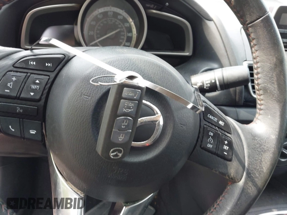 2014 Mazda 3 i Touring z VIN JM1BM1V75E1148848, wystawiony jako IAAI lot #42200934 z przebiegiem 134 176 mil mil oraz . Historia ofert i sprzedaży dostępna na DreamBid. Obrazek 11.