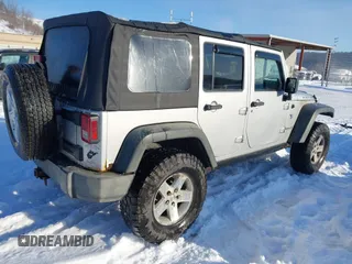 2008 Jeep Wrangler Unlimited Rubicon with VIN 1J4GA69198L615547, listed as a IAAI auction lot 41351138 with 213,487 mi miles and . Bid and sale history available at DreamBid. Image 4.