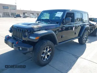 2021 Jeep Wrangler Unlimited Rubicon with VIN 1C4JJXFM5MW722572, listed as a IAAI auction lot 41667167 with Not provided miles and . Bid and sale history available at DreamBid. Image 2.