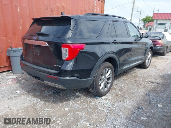 2022 Ford Explorer XLT z VIN 1FMSK8DH0NGC02932, wystawiony jako IAAI lot #42557795 z przebiegiem 90 991 mil mil oraz . Historia ofert i sprzedaży dostępna na DreamBid. Obrazek 4.