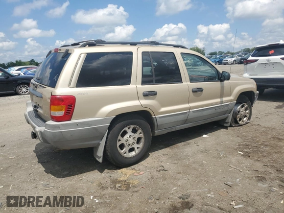 1999 Jeep Grand Cherokee Laredo with VIN 1J4GW58N7XC799434, listed as a Copart auction lot 64790905 with 272,384 mi miles and Salvage title. Bid and sale history available at DreamBid. Image 3.