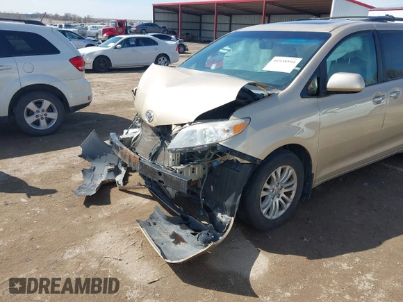 2012 Toyota Sienna XLE AAS with VIN 5TDYK3DC0CS202891, listed as a IAAI auction lot 41938594 with Not Provided miles and . Bid and sale history available at carsss.com. Image 20.