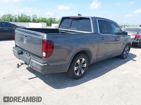 2019 Honda Ridgeline RTL with VIN 5FPYK2F59KB004653, listed as a IAAI auction lot 42066778 with 90,144 mi miles and . Bid and sale history available at DreamBid. Image 4.