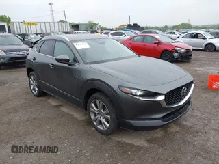 2023 Mazda CX-30 S Preferred with VIN 3MVDMBCM5PM576771, listed as a IAAI auction lot 42244842 with 14,814 mi miles and . Bid and sale history available at DreamBid. Image 1.