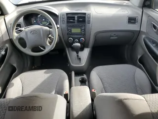 2009 Hyundai Tucson GLS with VIN KM8JM12B79U012399, listed as a Copart auction lot 77663414 with 164,615 mi miles and Salvage Title. Bid and sale history available at carsss.com. Image 8.