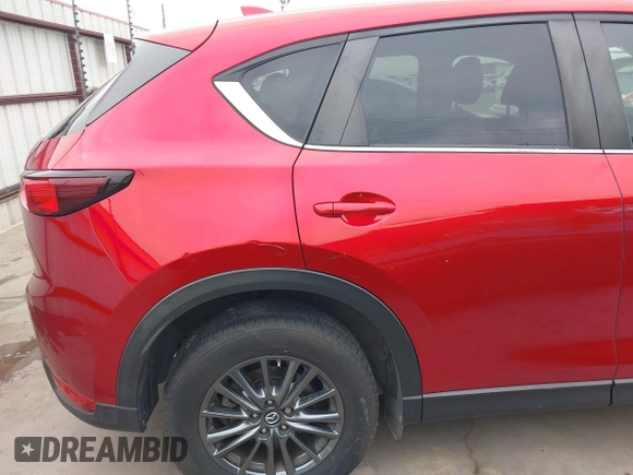2019 Mazda CX-5 Touring with VIN JM3KFACM7K0696815, listed as a IAAI auction lot 41921763 with 46,900 mi miles. Bid and sale history available at carsss.com. Image 20.