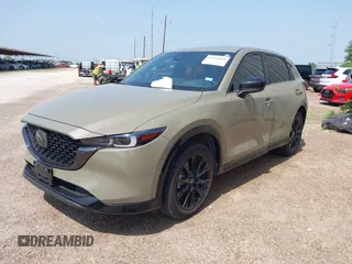 2024 Mazda CX-5 Carbon Edition with VIN JM3KFBAY8R0428460, listed as a IAAI auction lot 41936838 with 11,095 mi miles and . Bid and sale history available at DreamBid. Image 2.