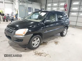 2007 Kia Sportage LX z VIN KNDJE723177439778, wystawiony jako IAAI lot #42279004 z przebiegiem 198 994 mil mil oraz . Historia ofert i sprzedaży dostępna na DreamBid. Obrazek 2.