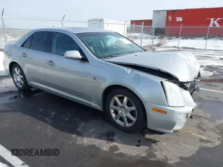 2005 Cadillac STS with VIN 1G6DW677950236453, listed as a IAAI auction lot 41695548 with 142,341 mi miles. Bid and sale history available at carsss.com. Image 1.