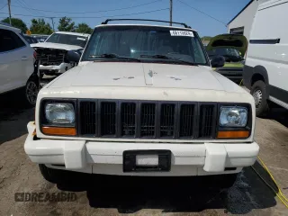1998 Jeep Cherokee Sport with VIN 1J4FJ68S1WL259582, listed as a Copart auction lot 68115624 with 235,380 mi miles and Salvage Title. Bid and sale history available at carsss.com. Image 5.