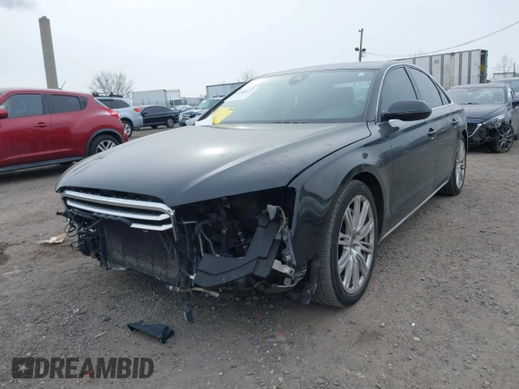 2012 Audi A8 с VIN WAUAVAFD0CN035731, выставлен на аукционе IAAI как лот 41286022 с пробегом 82 835 миль миль и . История ставок и продаж доступна на DreamBid. Изображение 20.