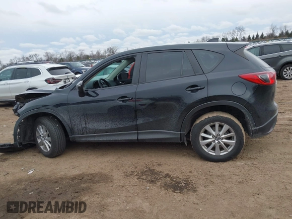 2015 Mazda CX-5 Sport with VIN JM3KE4BY9F0495948, listed as a IAAI auction lot 41501840 with 145,959 mi miles. Bid and sale history available at carsss.com. Image 15.